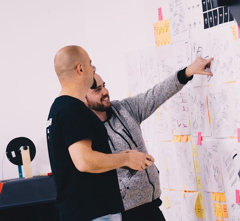 CodeFish Studio team members in a workshop