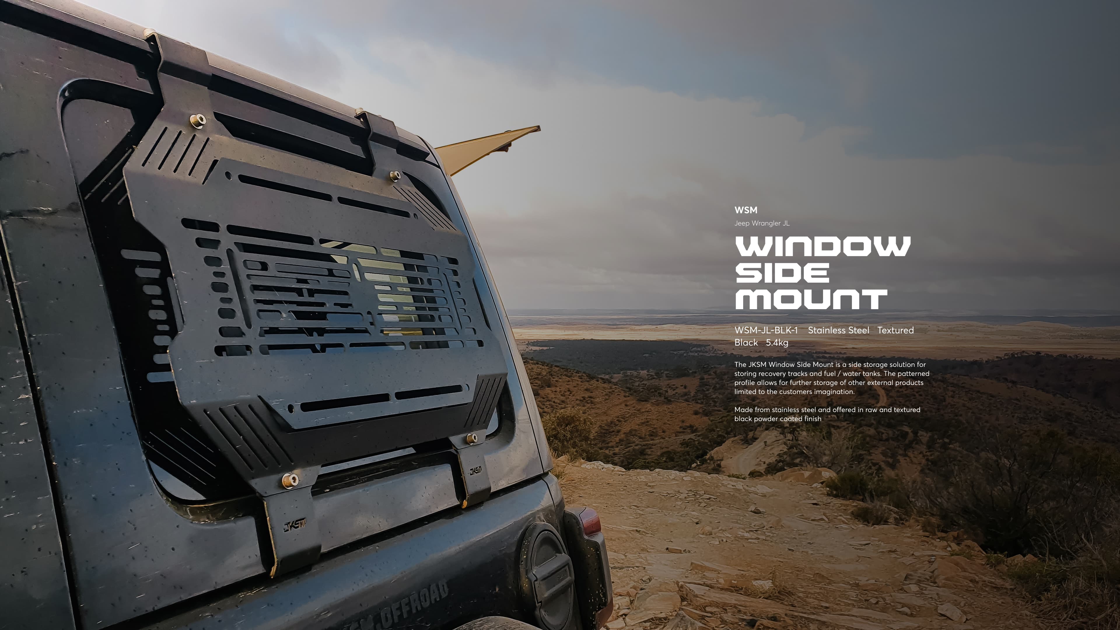 Product shot of the Window Side Mount storage panel fitted to a four-wheel drive on a clifftop track